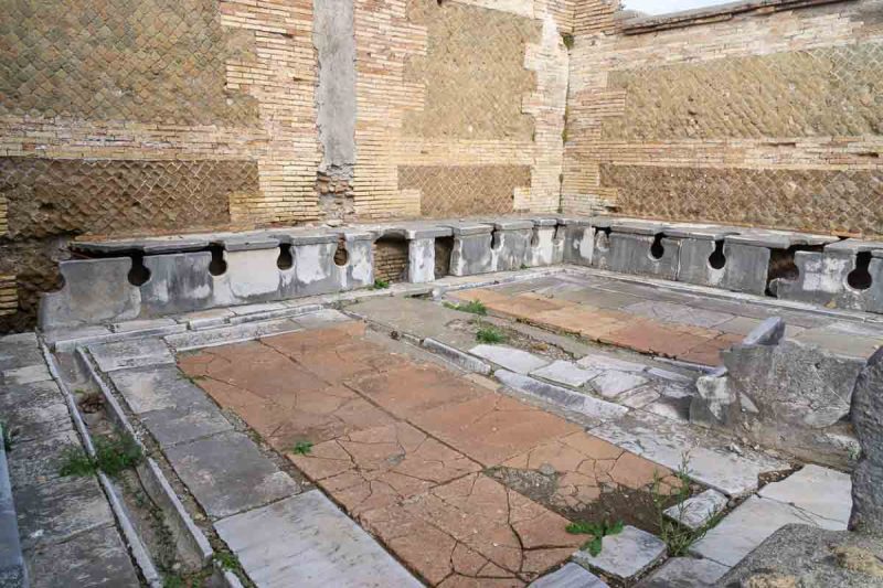 well preserved ancient marble latrines at ostia antica