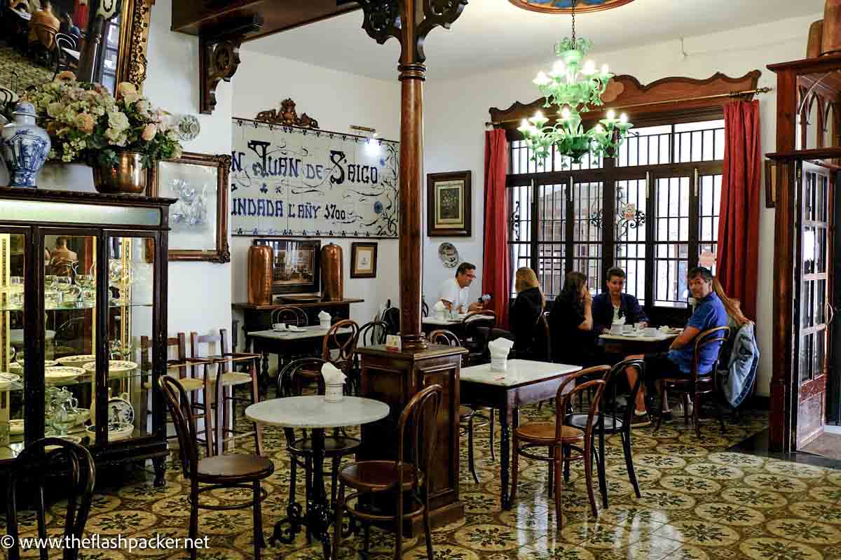 interior of old fashioned cafe decorated with ceramic tiles