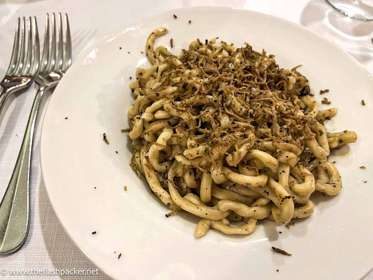 plate of pasta with shaved truffles