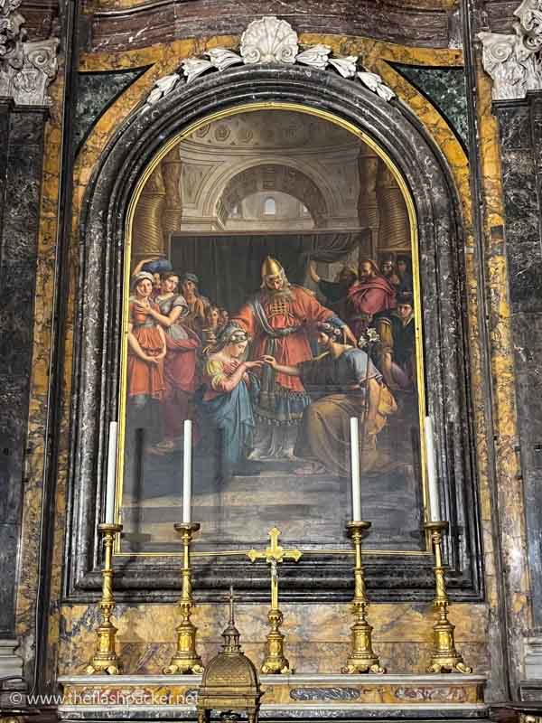 altar of the small chapel of the holy ring in perugia cathedral with a painting depicting the marriage of mary and joseph