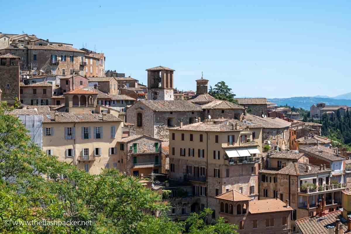 old houses of perugia spilling down a hillside