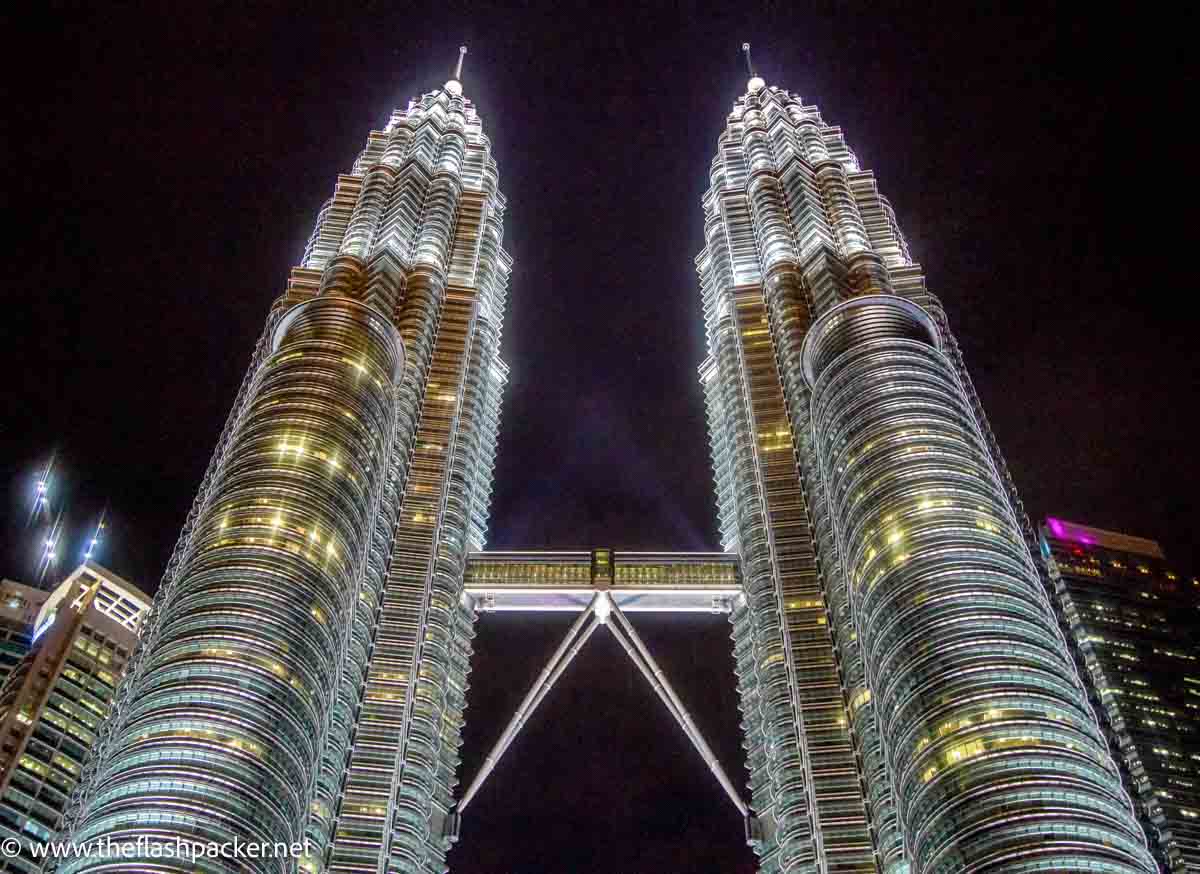 the twin towers in kuala lumpur malaysia lit up at night