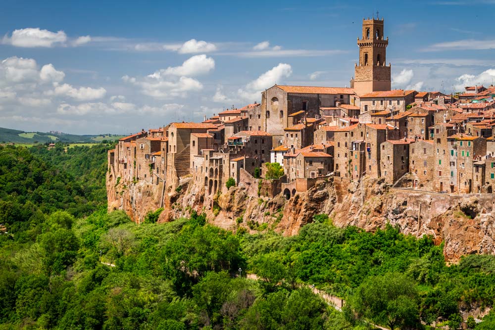 one if the beautiful villages in tuscany on a hillside