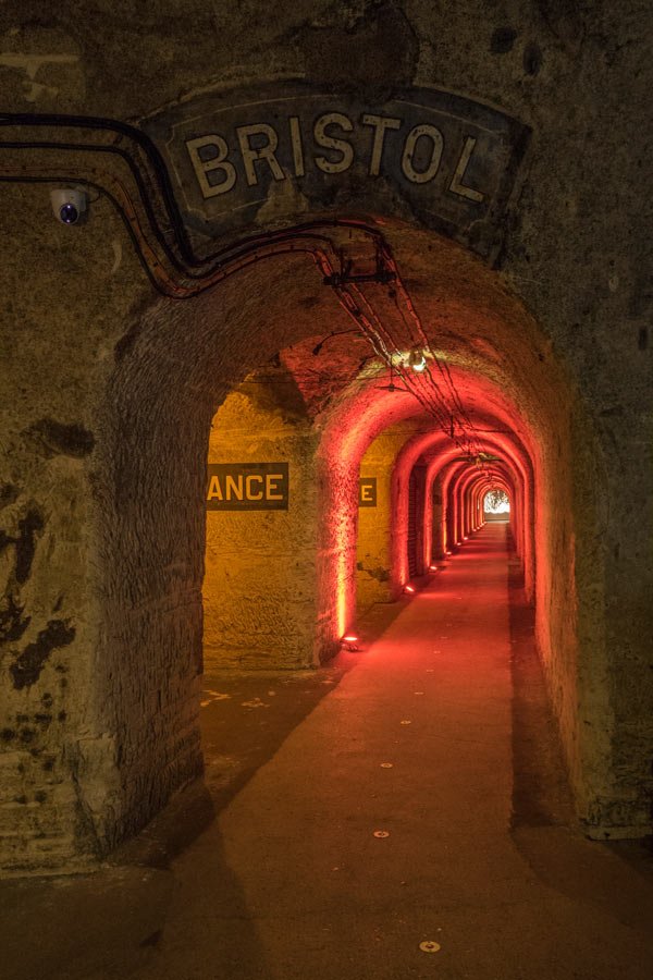 illuminated cavern with red lighting and place names