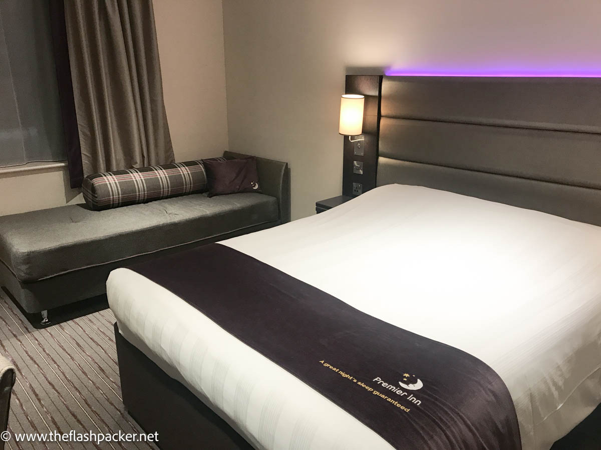 bed in hotel room at premier inn heathrow airport terminal 4