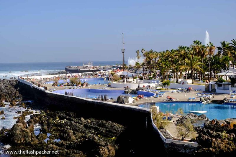 people enjoying water park by the sea in puerto de la cruz tenerife