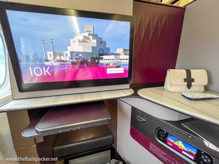 business class airplane seat in Qatar Airways QSuite review