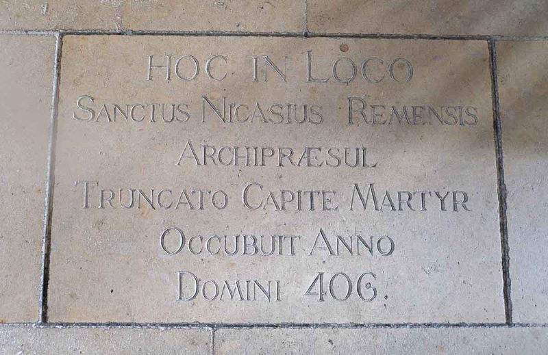 memorial plaque in floor of reims cathedral