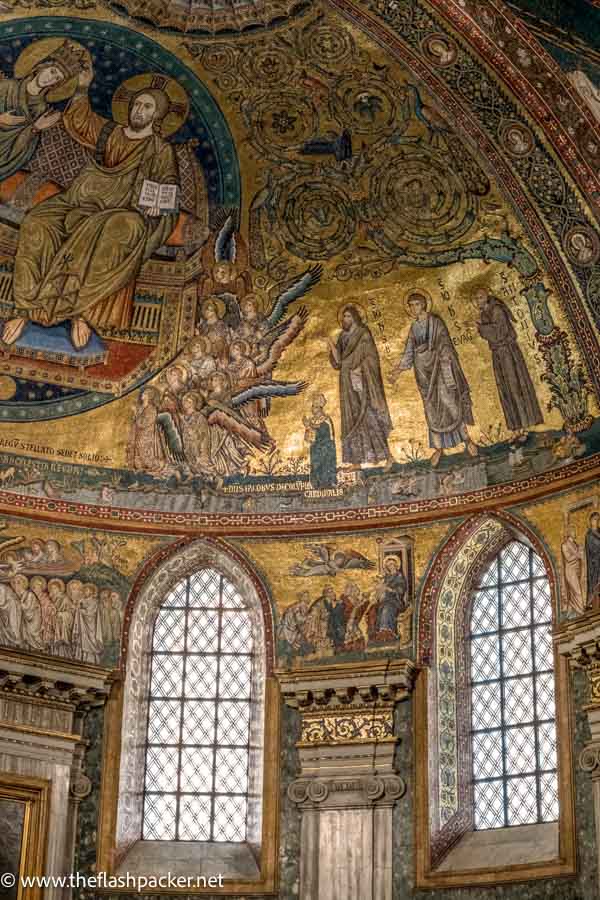 vibrant gold mosaics decorating ceiling of church