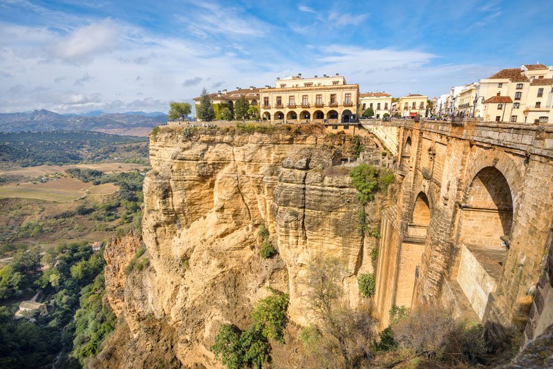 old srtone bride and town of ronda overlooking a steep gorge