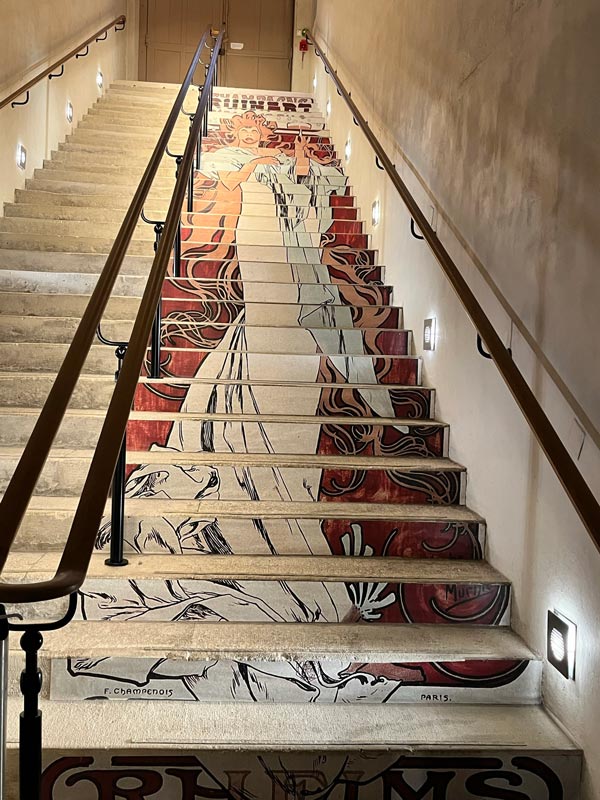 set of steps painted with an image of a lady