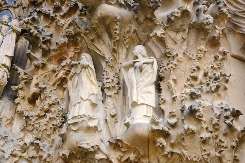 stone carving of two angels