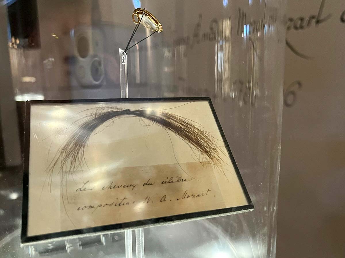 lock of mozart's hair in a display case