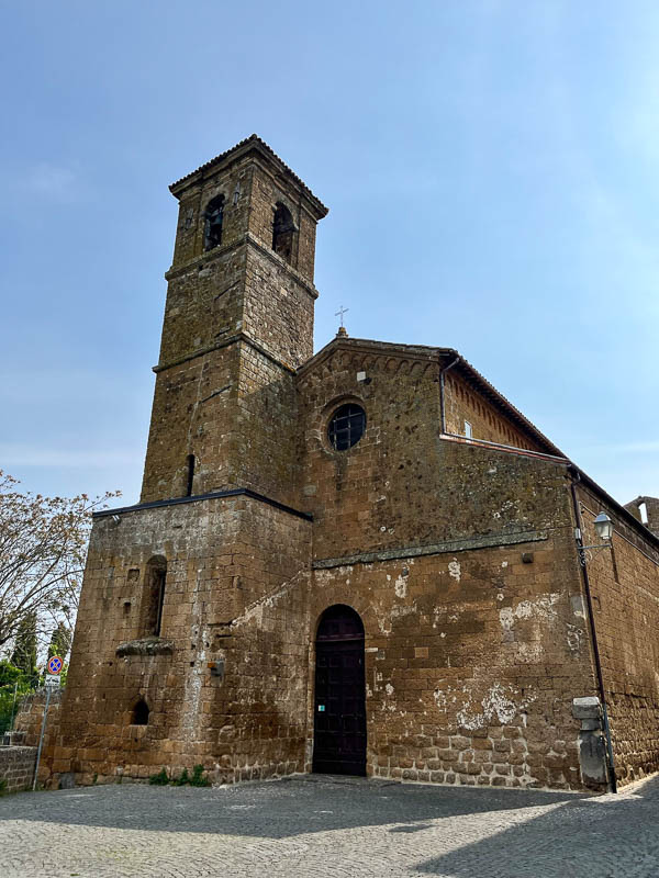 front of very old stone church of san giovanale in orvieto itali