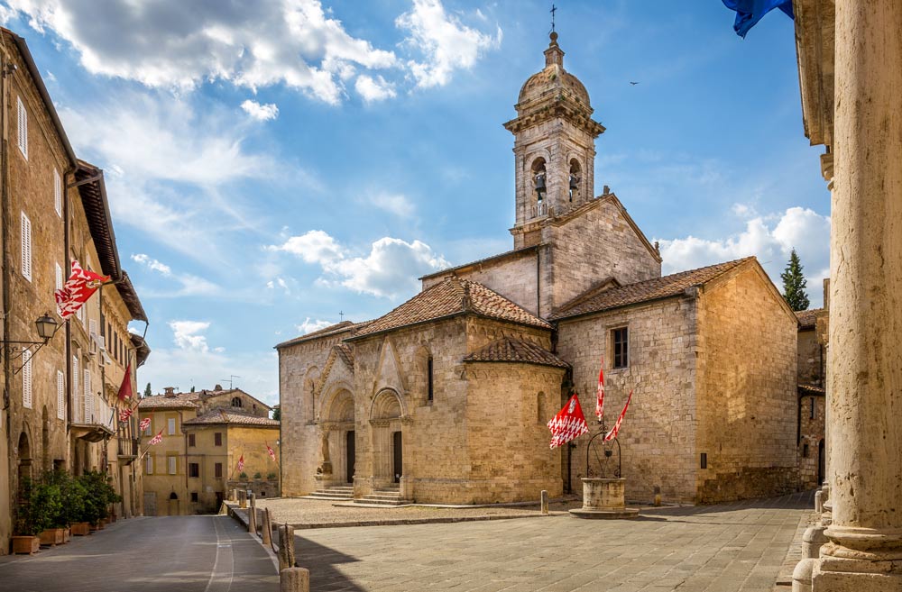 pretty church in a small sqaure in a village in tuscany