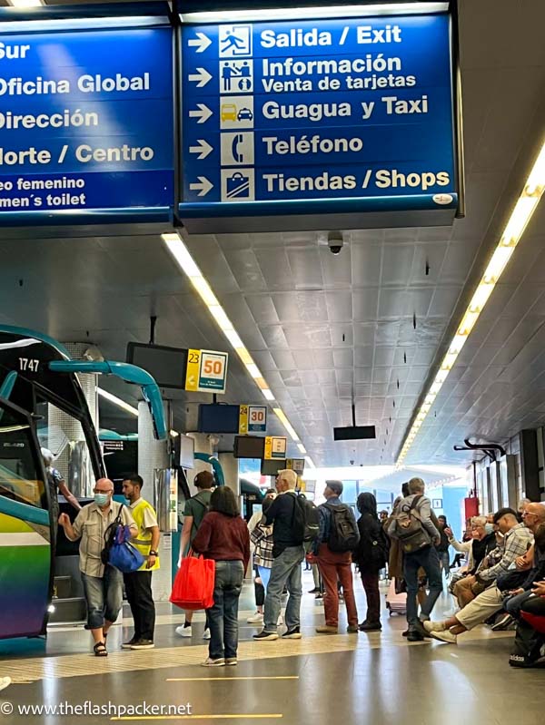 people in a bus station in gran canaria