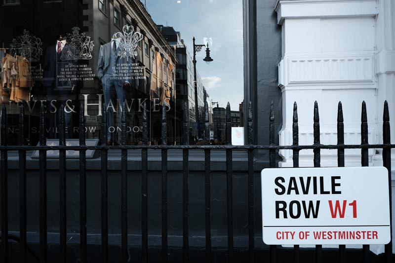 sign for saville row london outside a gentlemens tailors