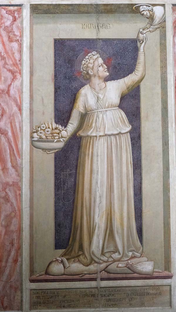 fresco of classical female figure holding a bowl of fruit