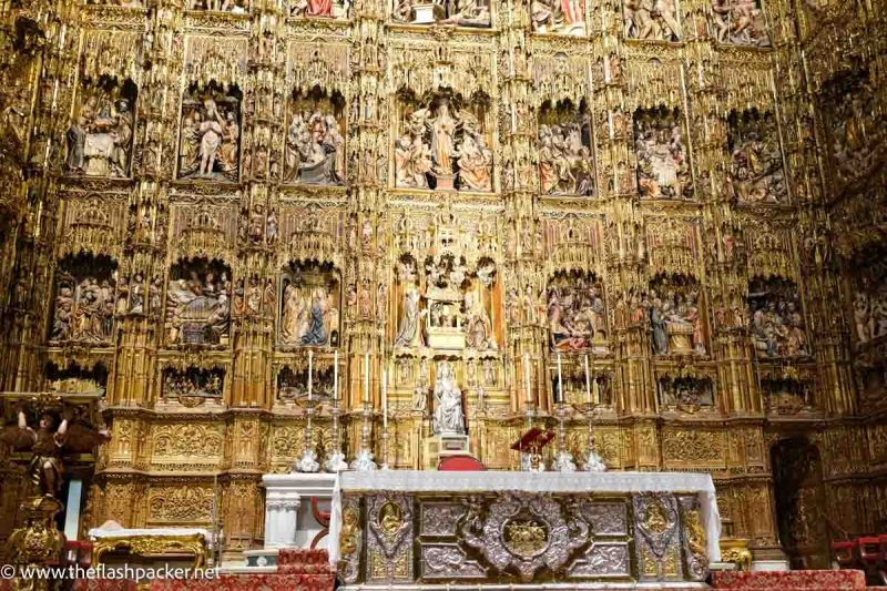 elaborate gilded altar which is a highlight of seville cathedral