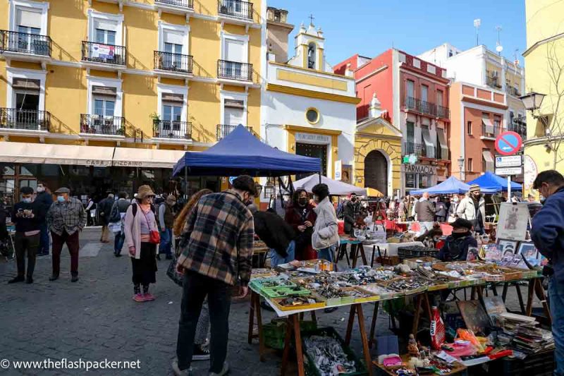 people browsing stalls at a street market