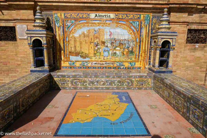 vivid tiles showing battle scene and the word almeria