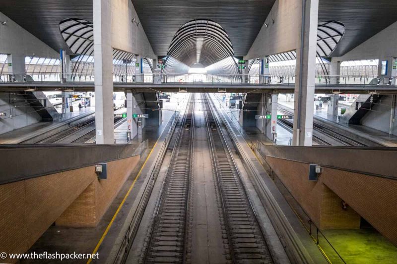 looking down on to platforms in huge railway station