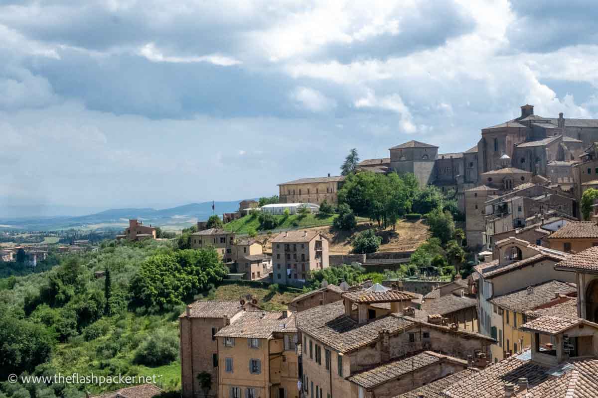 view over the rooftops of siena to the Tuscany countryside