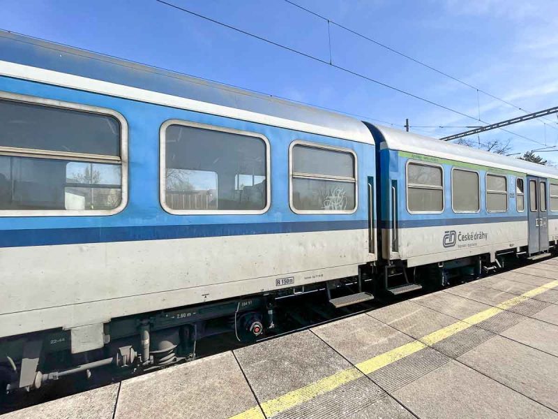 blue and white czech regional train