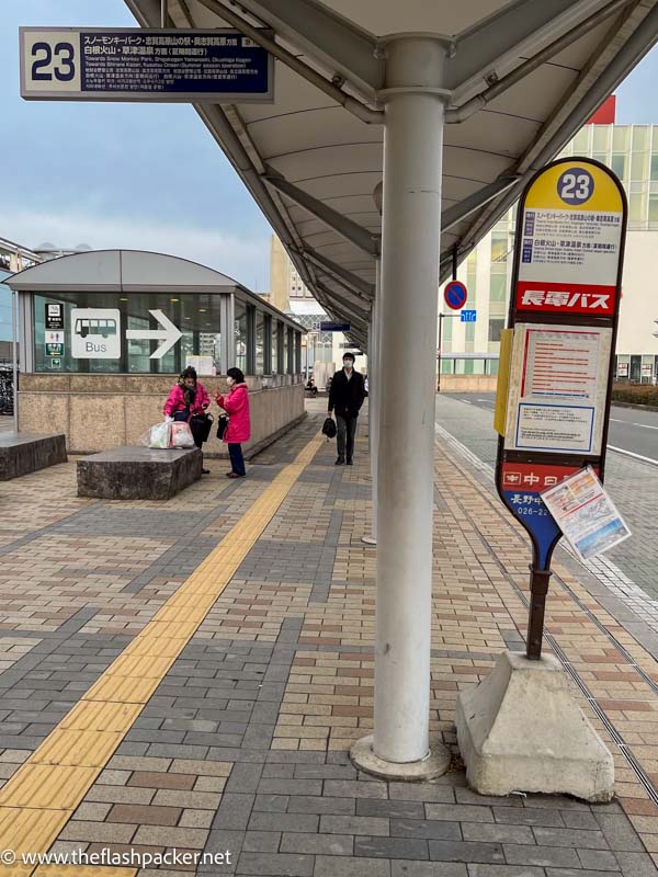 A bus stop outside nagano station in japan