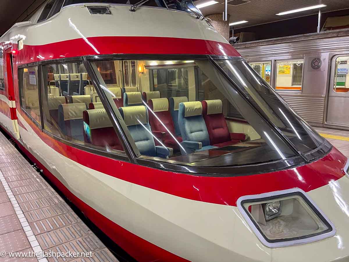 nose of modern red and white train