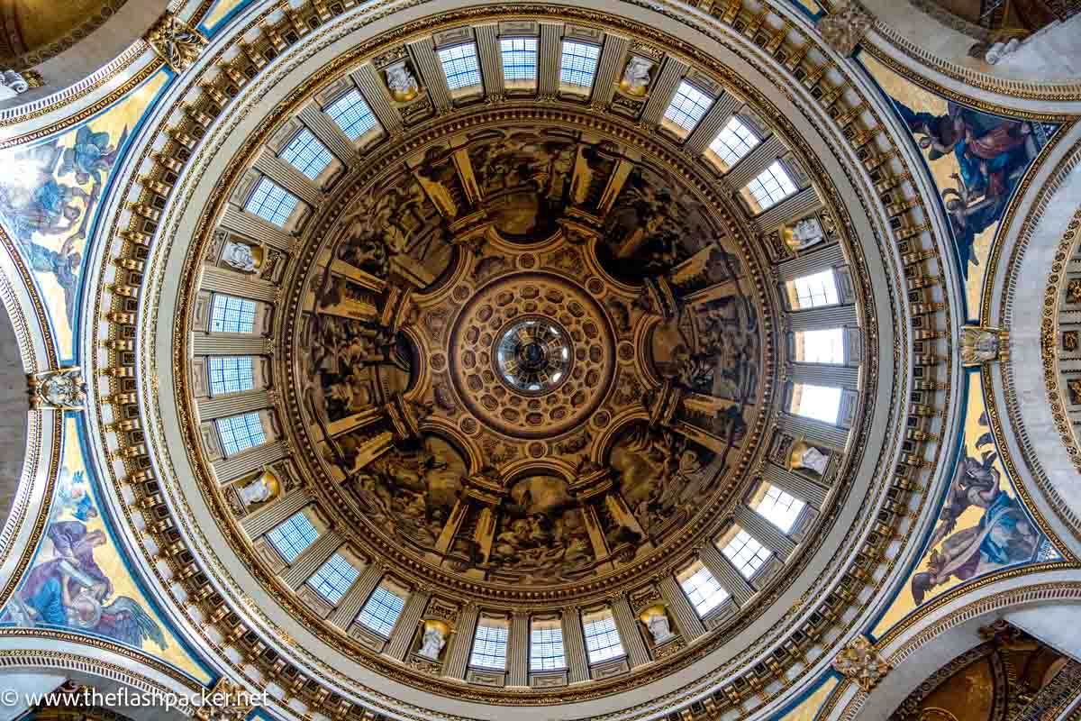 painted interior of dome of st pauls cathedral london