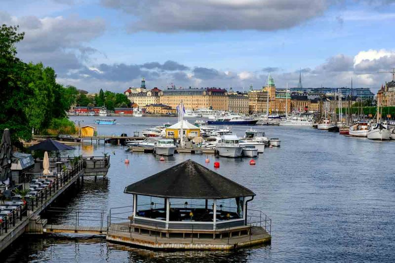 river with boats and lined with buildings