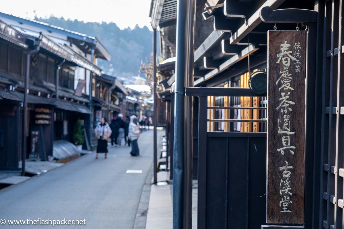 picturesque street in takayama japan with traditional wooden buildings