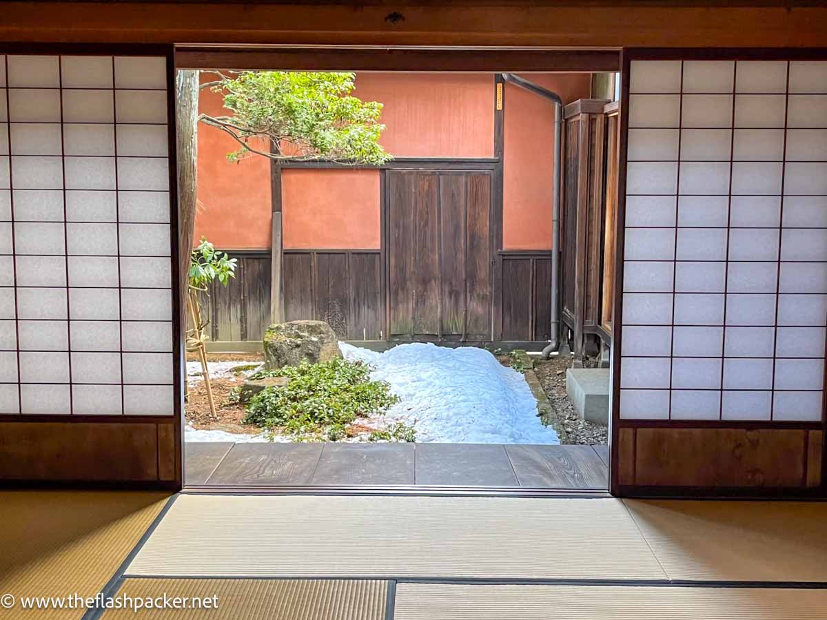 opeining to a small courtyard from a traditional japanese house