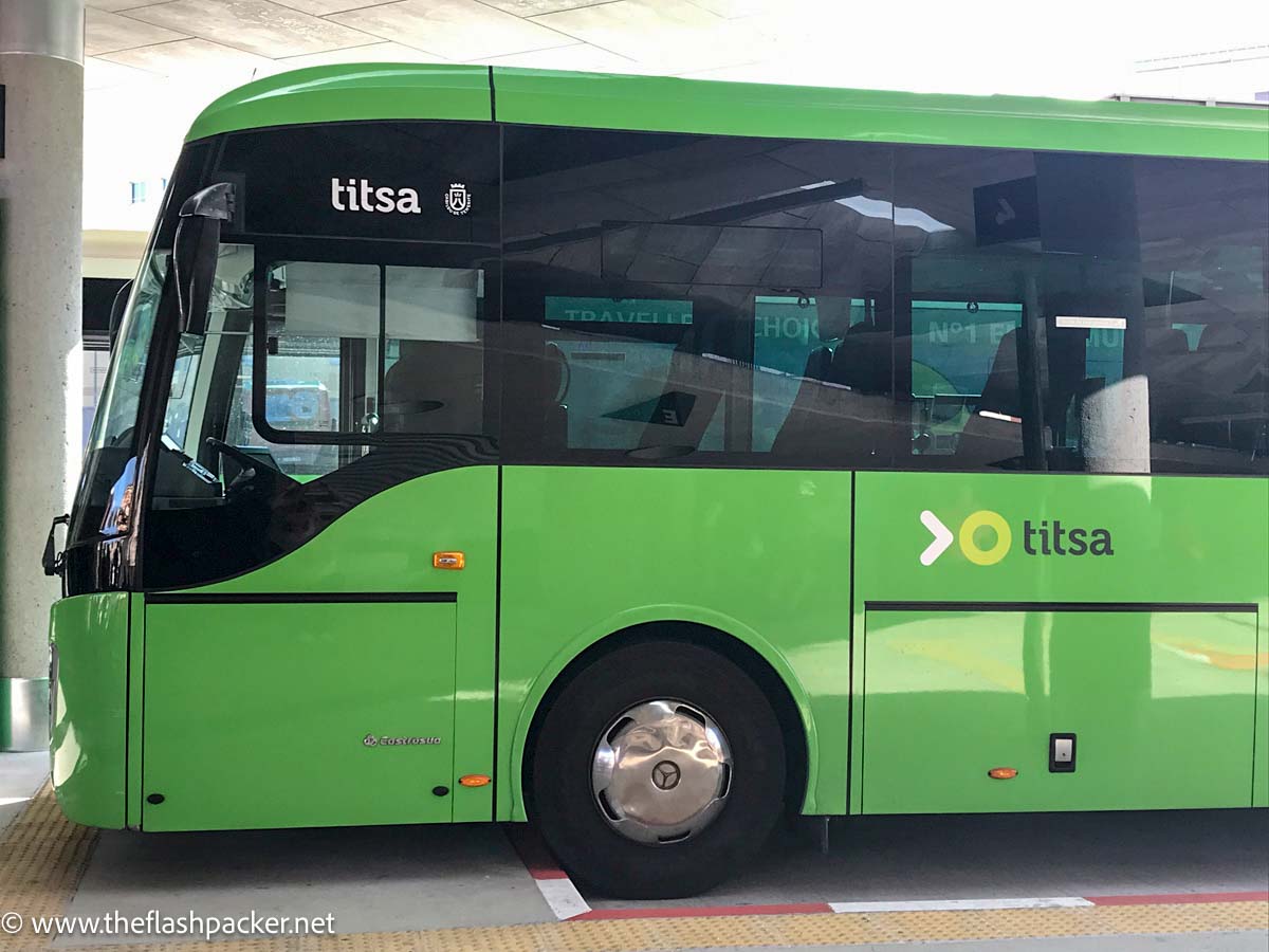 a green titsa tenerife bus