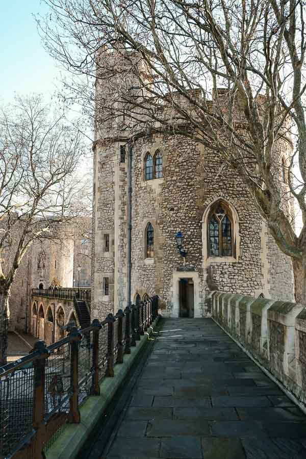 pathway of battlement leading to an old tower