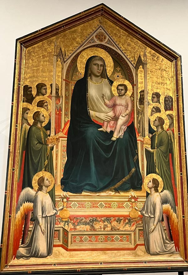 painting of madonna and child with saints and angels