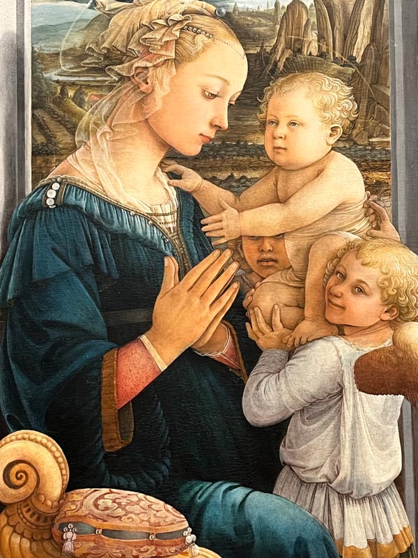 painting of madonna and child and 2 angels