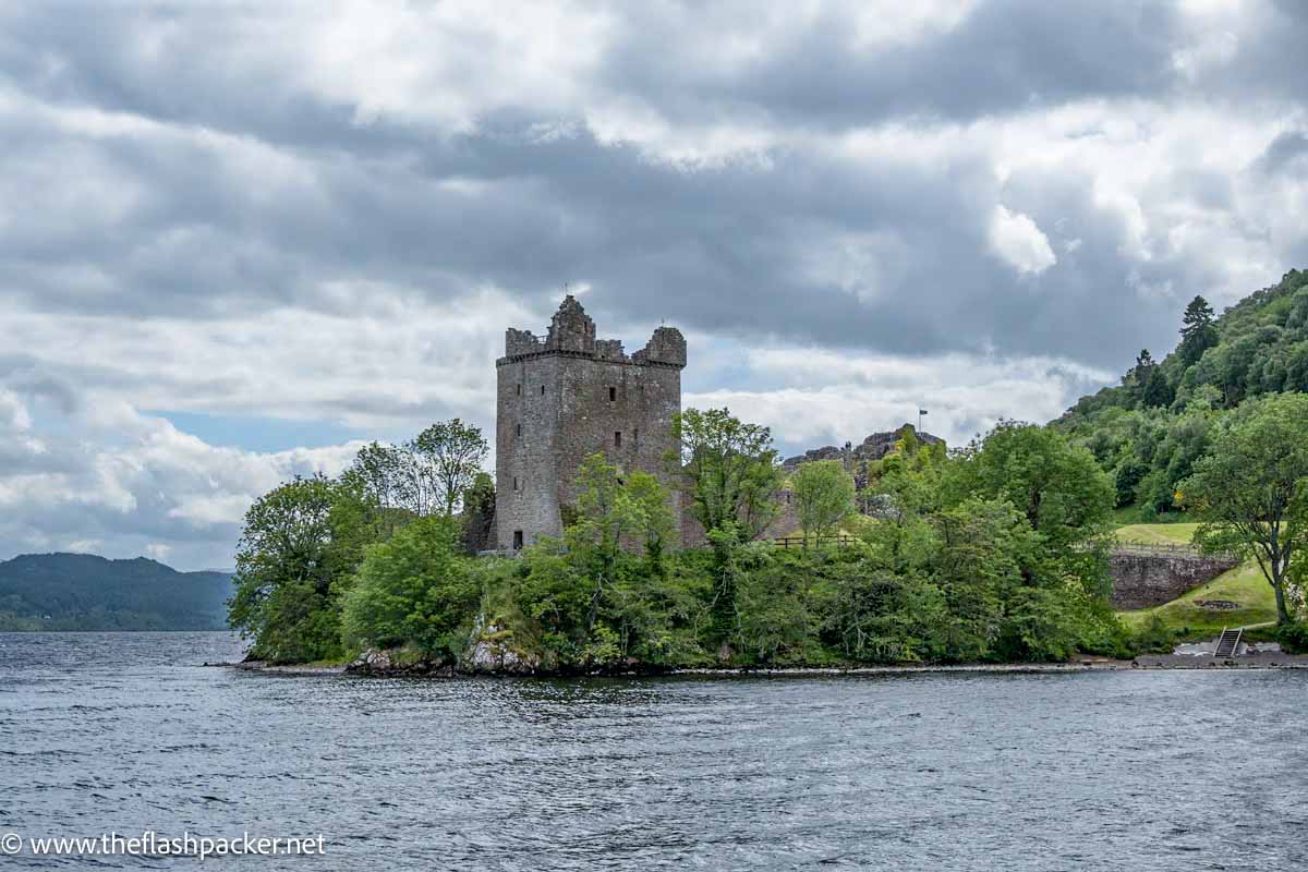 ruins of old castle by lake