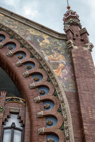 art nouveau sculpting and paintings on outside of building