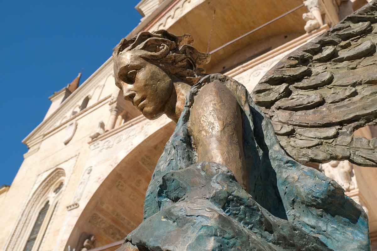 painted bronze sculpture of an angel