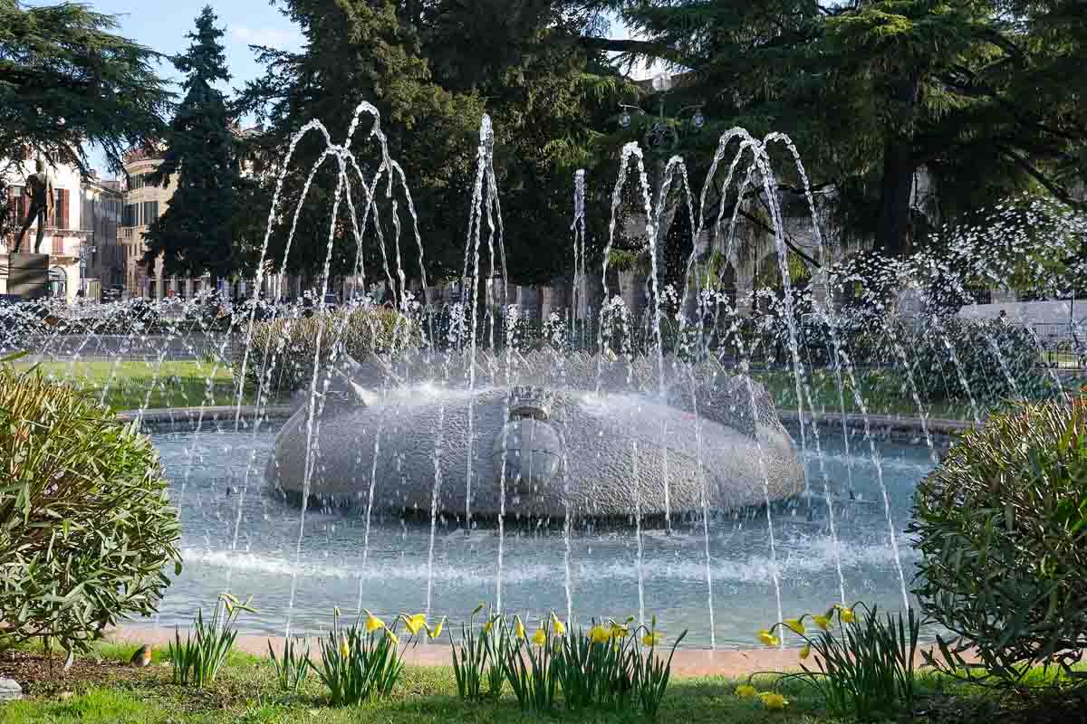 circular stone fountain gushing water