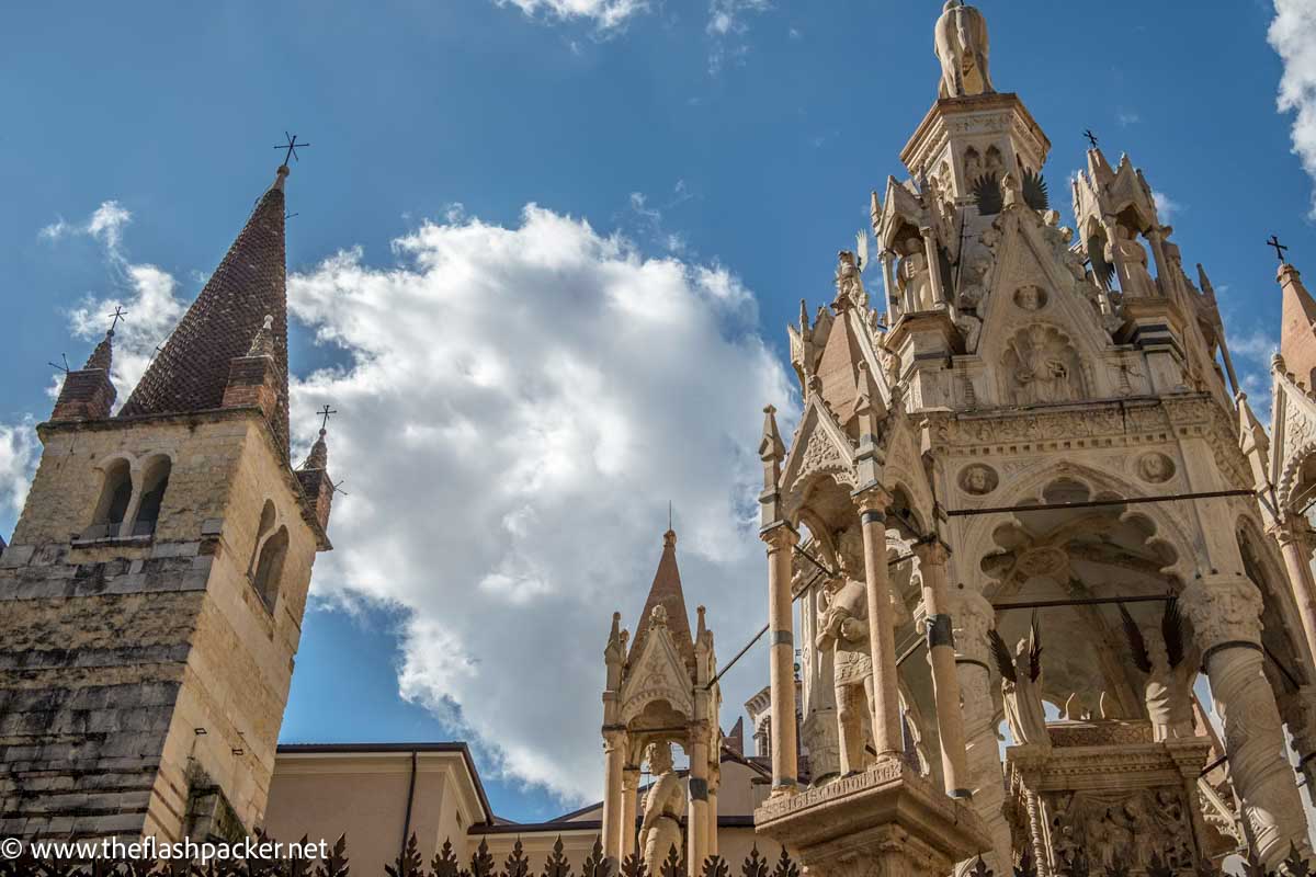 elaborate outdoor large gothic tombs with spires and statuettes