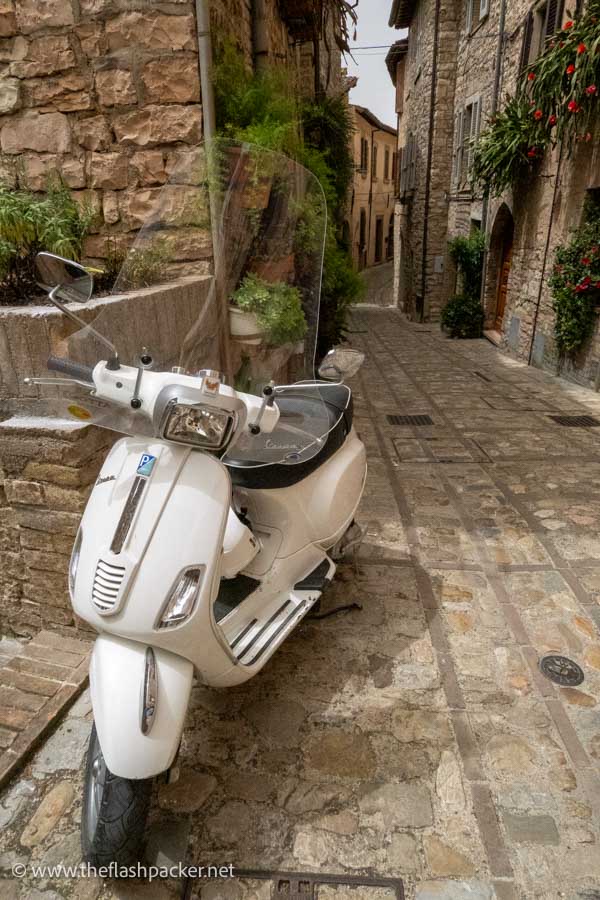 vespa scooter in old italian street