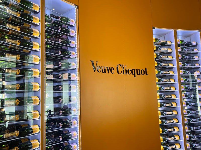 wall display of bottles of veuve clicquot champagne